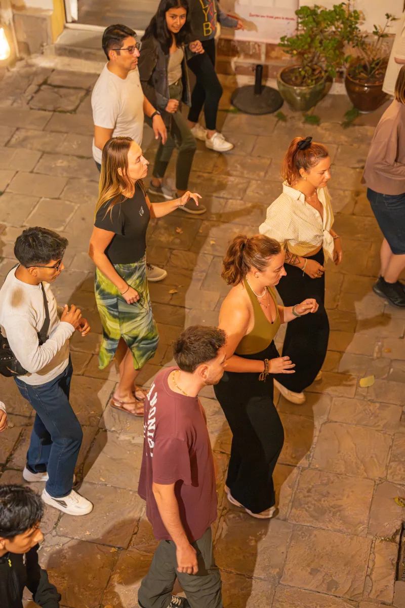 The salsa class lined up for the first basic step